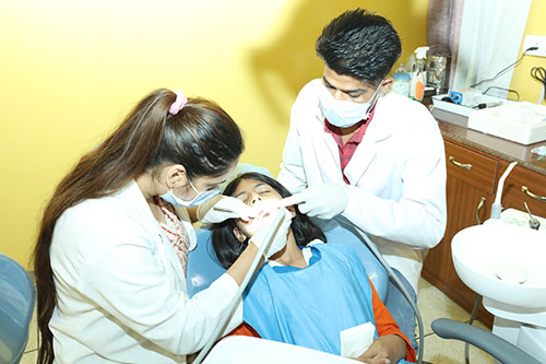 Patient receiving Patanjali dental treatment for oral health